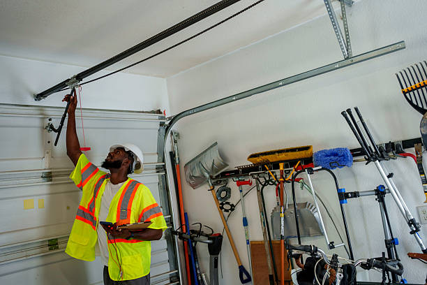 Professional Garage Door Panel Replacement technician working in Urbana, IA